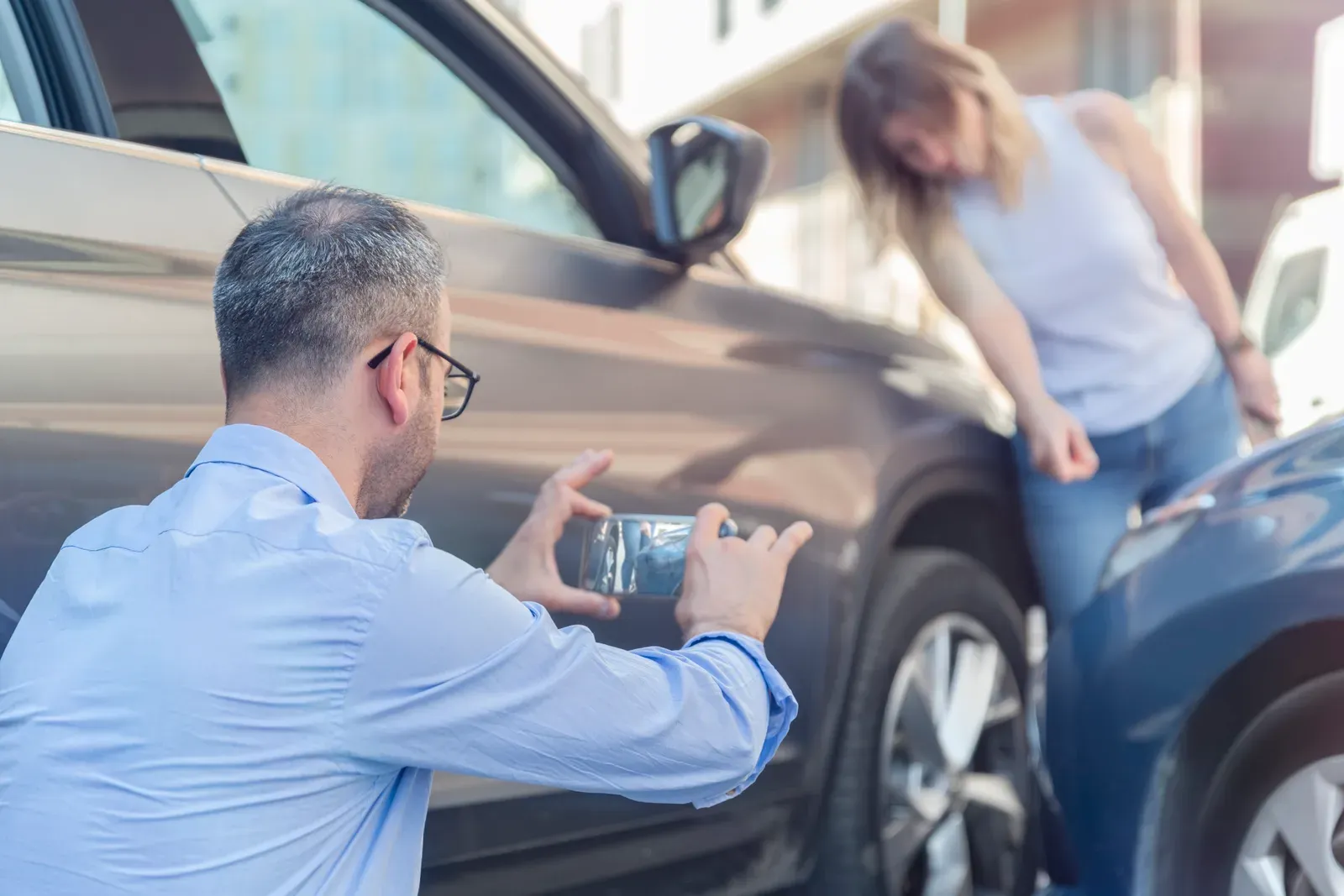 A car with collision damage at the accident scene