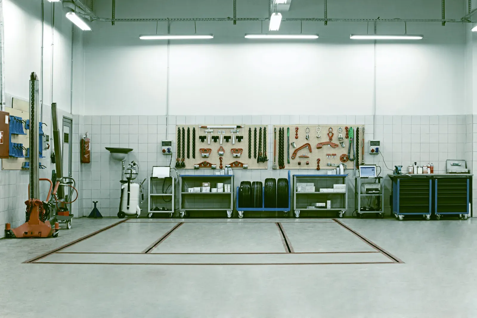 Inside the body shop, bays and tools ready for the day