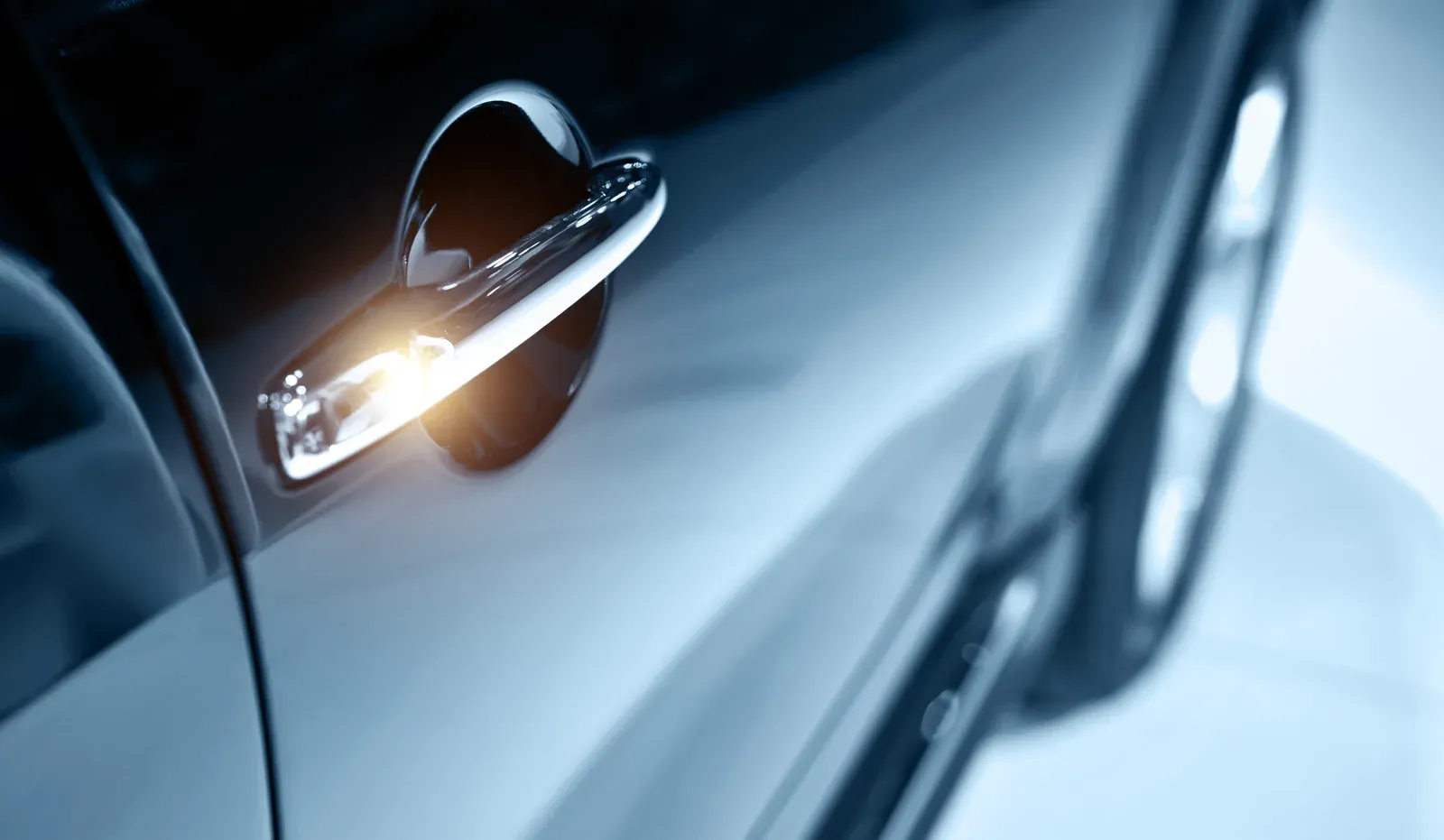 Close view of finished clearcoat gloss on a repaired Volkswagen panel at Collision Auto Center